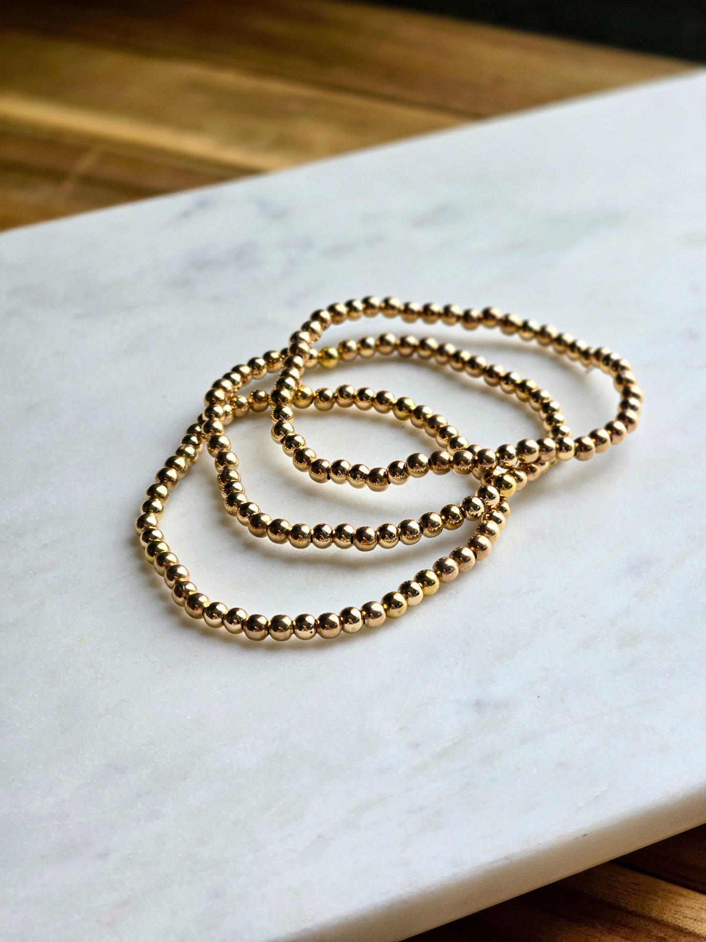 Aurum Elegance - Classic Gold Bead Bracelet