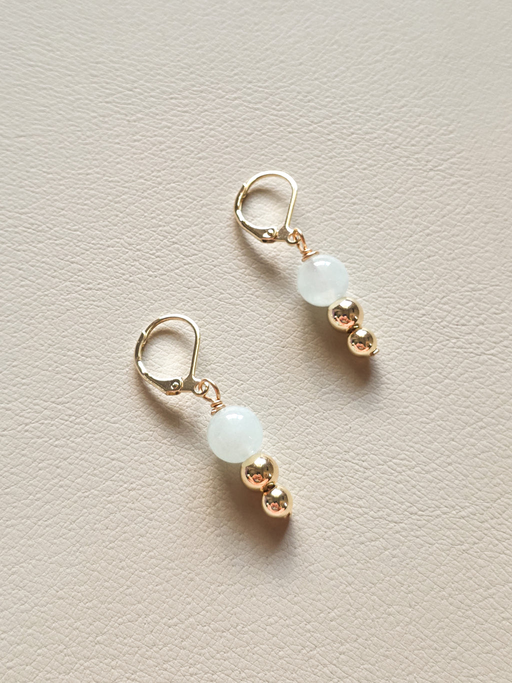 Pair of earrings with aquamarine stone and gold filled beads