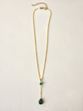 Malachite drop pendant necklace with gold PVD stainless steel chain and polished green stone details.