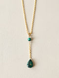 Malachite drop pendant necklace with gold PVD stainless steel chain and polished green stone details.