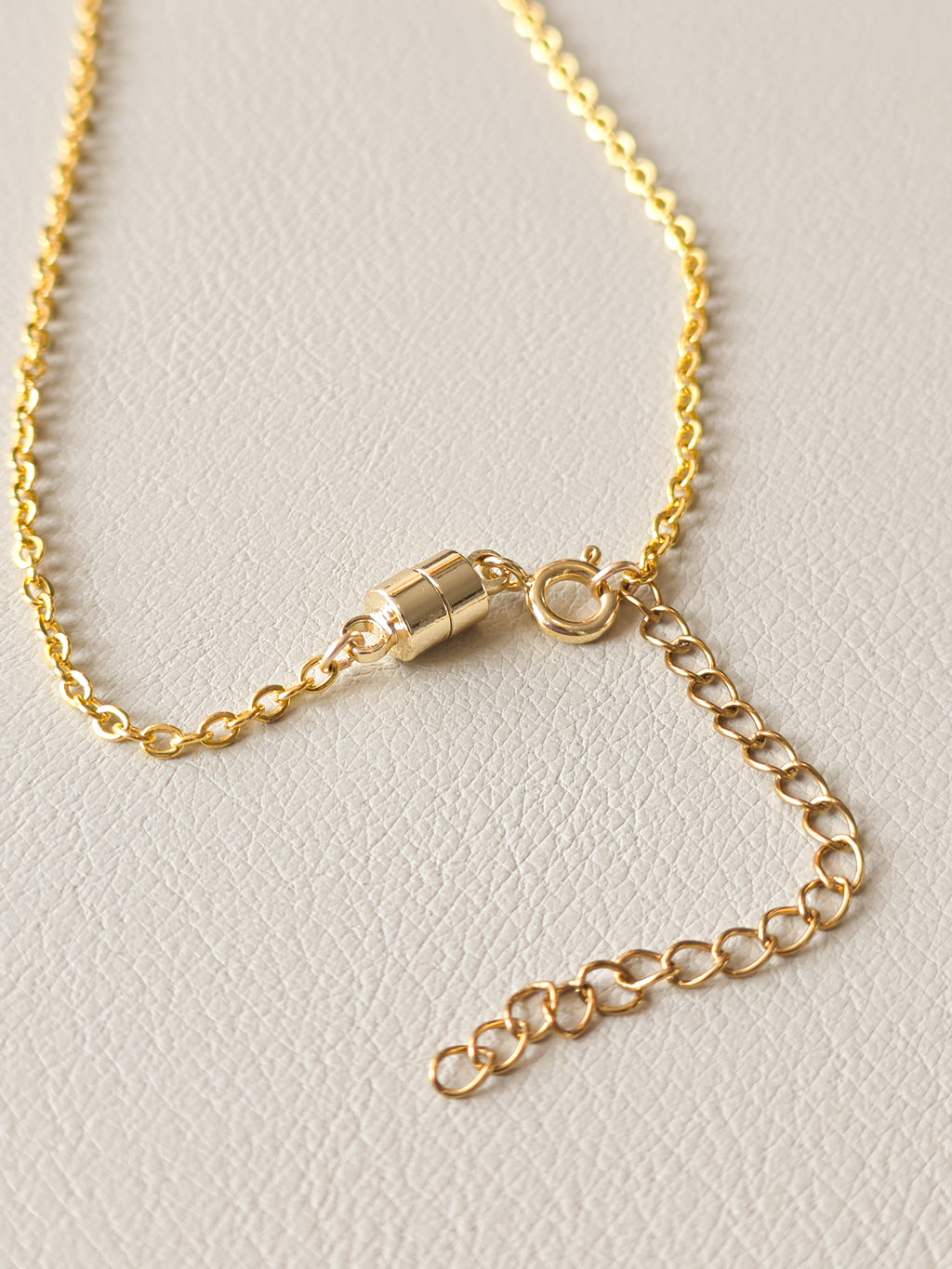 Close up of magnetic clasp on Malachite Gold Drop Pendant Necklace